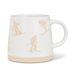 Tasse avec skieurs