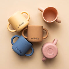 Tasse d'apprentissage avec poignées