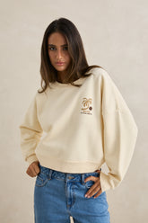 Pull à col rond ample et à motifs palmiers