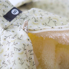 Petite trousse fleurs fond beige cylindre